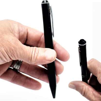 Slim-line digital spy pen recorder clipped securely inside a shirt pocket for covert note-taking